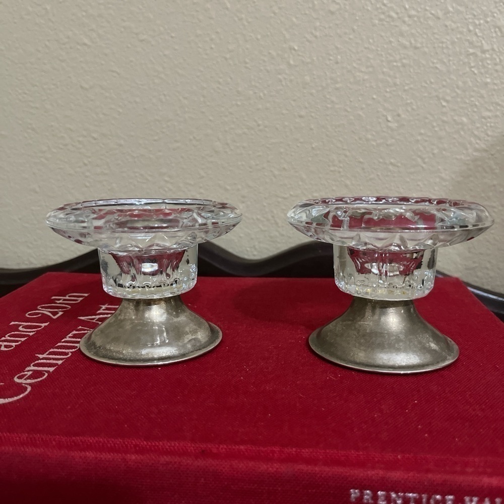 Silver tone candle holders with clear glass dishes